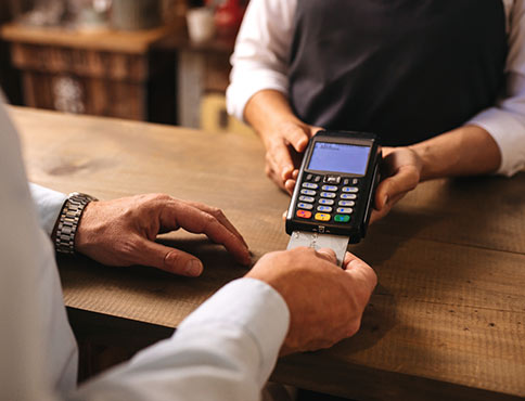 Man paying with credit card.