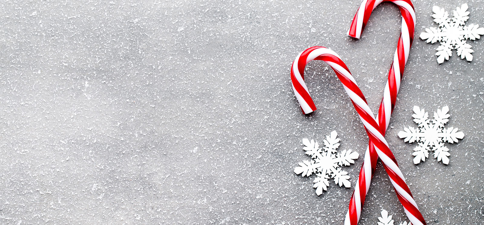 Candy cane. Christmas decors with gray background